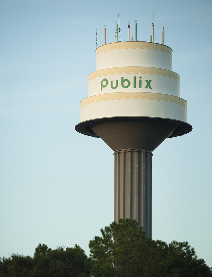 Publix facilities in Lakeland, FL feature a water tower with a birthday cake top. You can see it at 3223 New Tampa Hwy, Lakeland, FL.