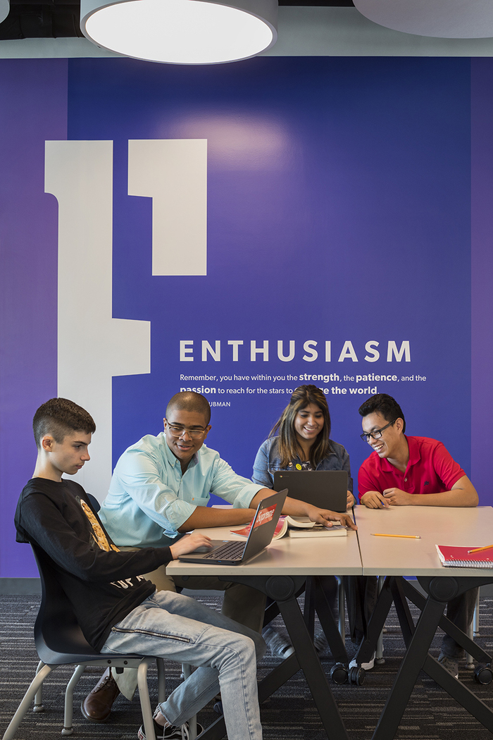 The stencil E for Enthusiasm is custom or from an unidentified typeface.