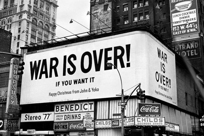 Times Square, New York City, December 1969. The text on this billboard is not set with type, but uses non-typographic lettering that was presumably more practical to apply at such a large scale.