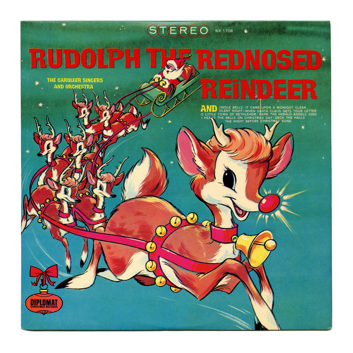 Diplomat Records, SX 1708 (1971). Illustration by George Peed. The band is here listed as “The Caroleer Singers and Orchestra”. The red and yellow letters are from , see the specimen below. This film typeface came with a number of alternates that could be inserted manually. On the record cover, the repeating letters are all identical. None of the interlocking alternates were used. The track list appears to be set in caps from .