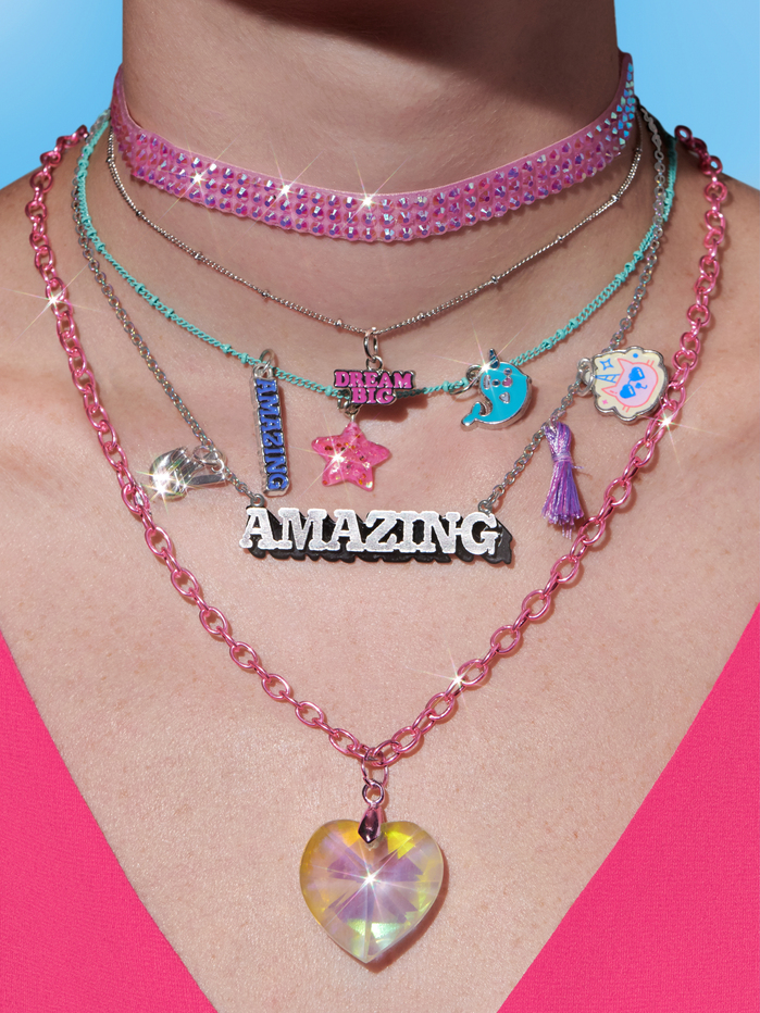 Necklaces featuring  (“Dream Big”) and  (“Amazing”).