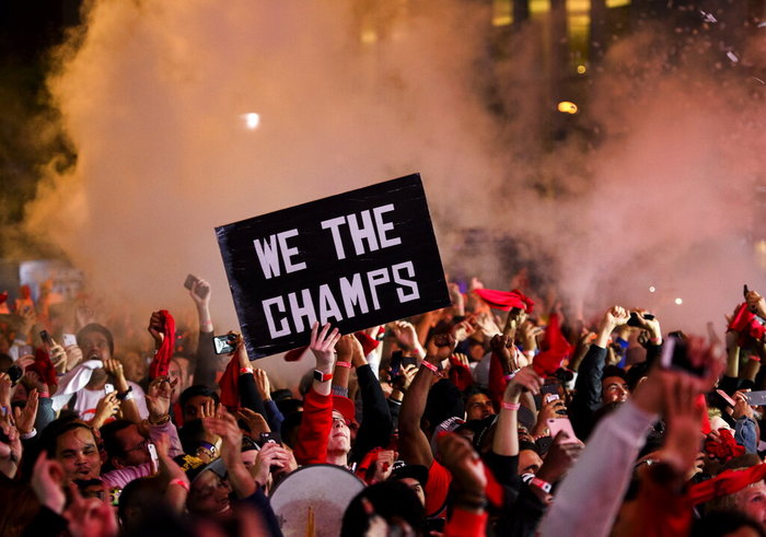 June 15, 2019: Toronto Raptors fans celebrate in Jurassic Park outside Scotiabank Arena in Toronto as the Raptors defeated the Golden State Warriors, 114-110, in Game 6 to win the NBA championship for the first time on Friday. (AP)