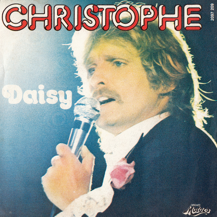“Daisy” / “Macadam”, 1976 French pressing on Les Disques Motors. [Discogs]  Outline originated at Face Photosetting and was adopted by Letraset for dry-transfer lettering.  is a Letraset original designed by Colin Brignall in 1970. Oopswhoops:


It is a well known fact that Christophe loved the band Suicide and “Macadam” on the B-side is the closest he ever got to Alan Vega’s songwriting.