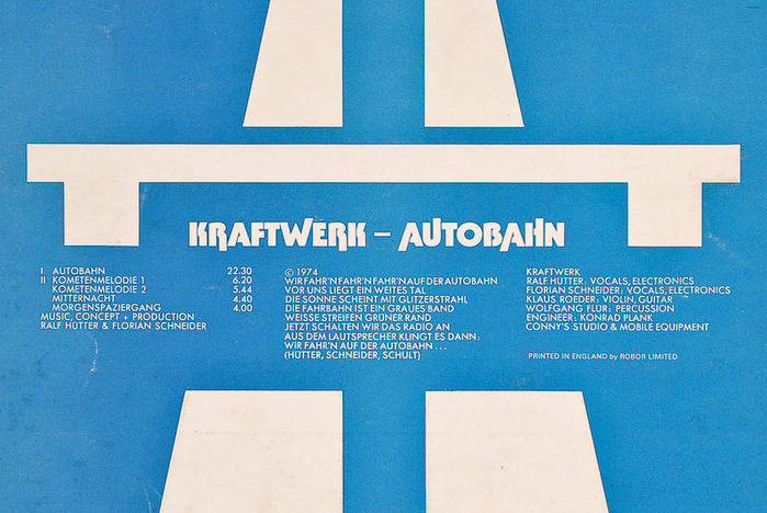 Detail from the back cover, with track list, lyrics of the title track, and credits, alls set in all-caps .