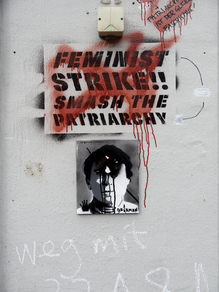 “Feminist Strike!! Smash the Patriarchy” stencil graffiti