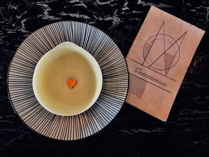 The wordmark in Luxus Brut also appears on the cover of the menu.