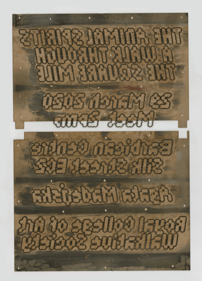 Plate for the second print run. The letterforms were lasercut from thin MDF sheets and glued to an MDF base. Due to the limited size of the lasercutter the plate had to be produced in two parts, which were brought together on the press and printed at the same time.