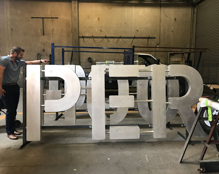 100 Hooper &amp; 150 Hooper identity and sign system 3