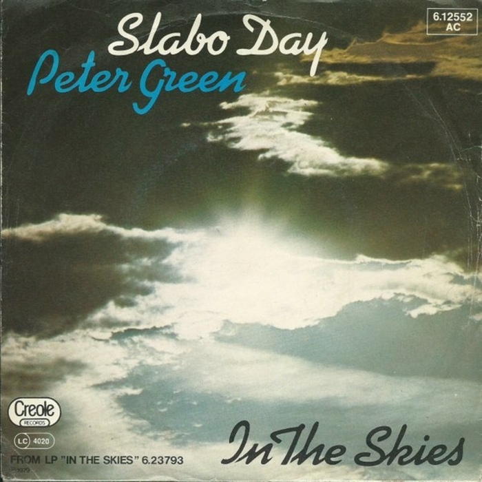 Kaufmann was also used for the “Slabo Day” / “In The Skies” single sleeve. Its G was modified, apparently to avoid any overlap with the line above.