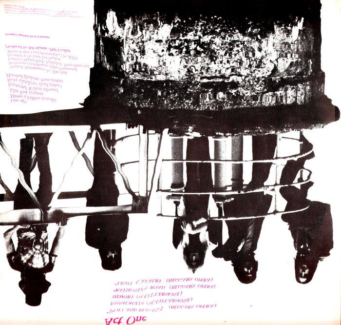 The opposite page shows a mirror image, with a darker version of the band portrait. The text is distorted as if it were reflected by the water surface.