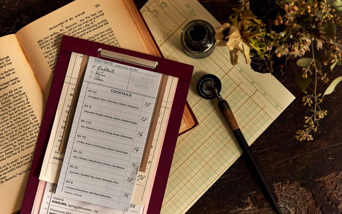 Cocktail menu featuring outlined  (“Alpen Rose”) and  (“Contents”), with  (“Cocktails”) and  for the “handwritten” additions.