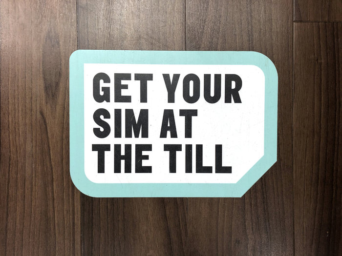 Sim-shaped floor display sticker