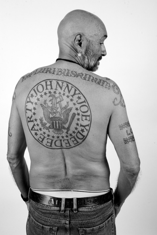 Arturo Vega had the logo tattooed on his back with his own name incorporated and a type style that is less stylized than Tiffany. That variant, like many similar variations seen today, more closely matches most contemporary incarnations of the presidential seal. (Photo by Curt Hoppe.)