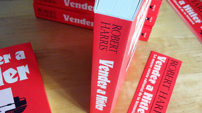 The author’s name on the cover and the spine uses  in all caps.