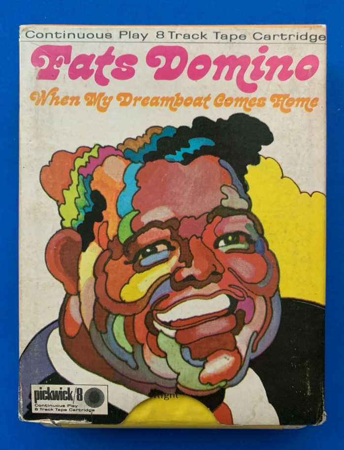 The cardboard sleeve to an 8-track tape cartridge offers less space than the cover for a 12″ vinyl record. Instead of scaling the illustration down beyond recognition, just a detail with Domino’s face was used. The type was rearranged accordingly, too.