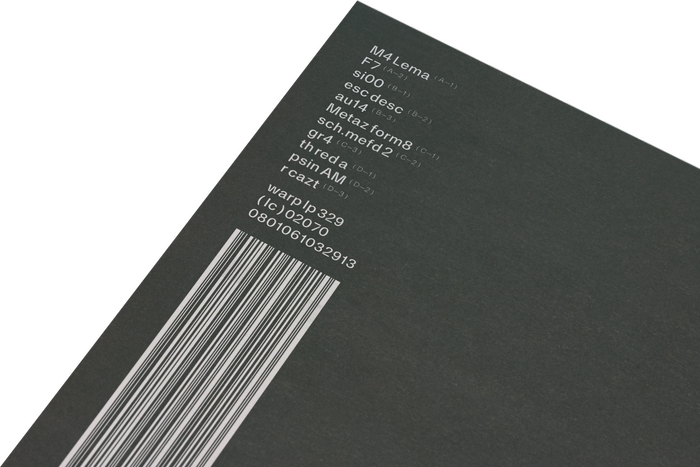 SIGN track list on the back cover.