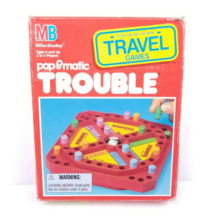 The travel edition from 1989 shows the Trouble logo in unmodified , i.e. without contour. “Travel Games” appears to be in another rounded face from 1970, .