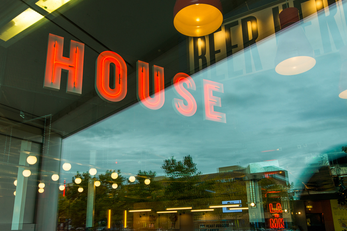 Draft House Milton Keynes, with interior graphics making use of the large windows to act as exterior signage
