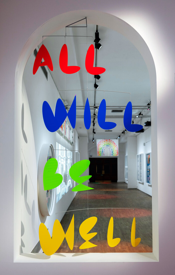 Mobile with the title in colored letters from BC Brief.