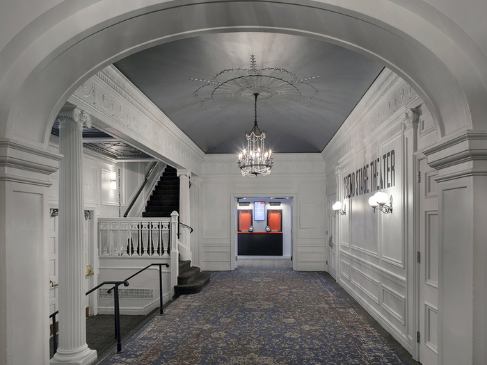 Helen Hayes theater — Lobby. Interior design by Rockwell Group. Type runs over the building’s historic mouldings.