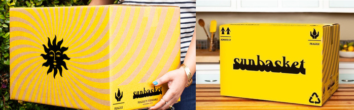 The delivery boxes use black and yellow and foreground the wordmark and the sun icon.