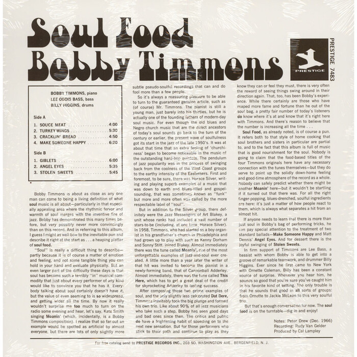 The back cover shows the title and the artist’s name in undistorted Art Tone, with track listing and liner notes set in .