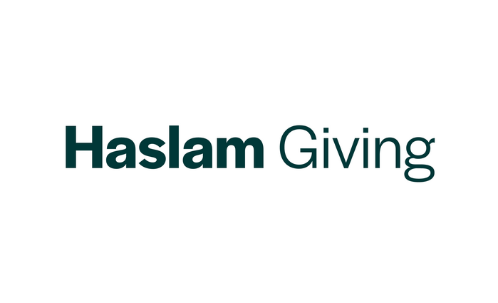 The Haslam Giving wordmark uses two contrasting weights of Halyard Display.