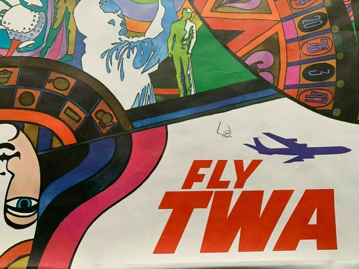 Detail with the Fly TWA logo.