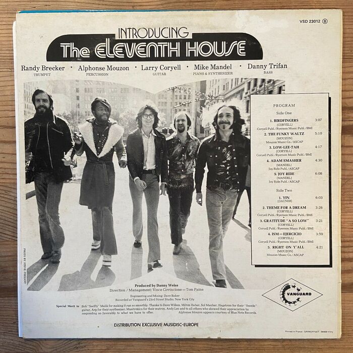 On the back cover, the band name is shown in reversed , with the names of the members in . The track list uses .
