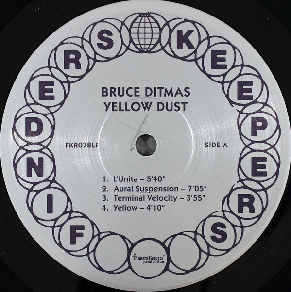 Yellow Dust record label (2015). Text in . “Finders Keepers” here seems to be based on  Bold.