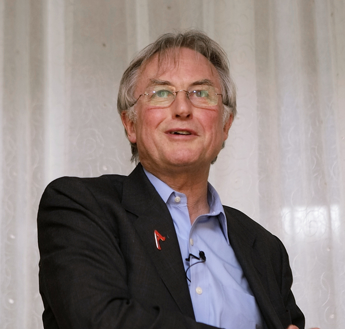 Richard Dawkins wearing the “scarlet A”  lapel pin at the 34th American Atheists Conference in Minneapolis, 2008.