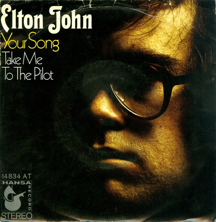 The German sleeve of “Your Song” – the album’s opening track and Elton John’s breakthrough single – with B-side “Take Me To The Pilot” uses a detail from Stanford’s portrait photograph. Thalia is here paired with  for the titles. The record was released by Hansa Records, 1970.