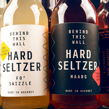 Behind This Wall hard seltzer labels