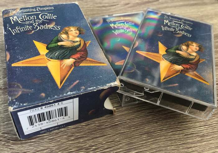 Casette slip cover and two cassette cases.