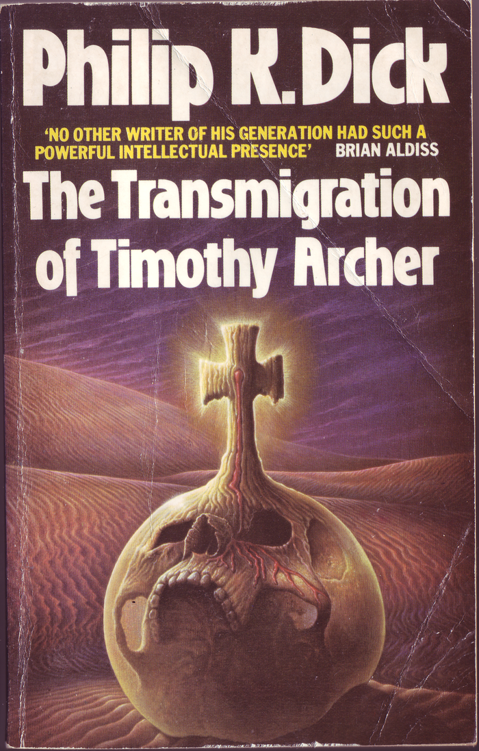 The Transmigration of Timothy Archer (1983). Cover art by by George Underwood. [More info on ISFDB]

The secondary typeface here is all-caps .