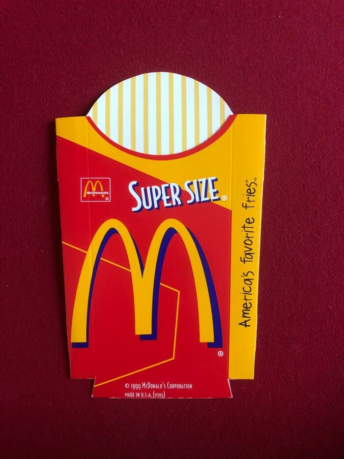 McDonald’s French fries packaging from 1999. Bodega Sans is used for “Super Size”.