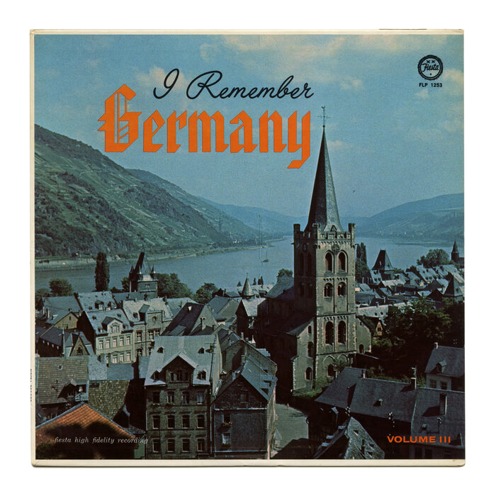 Vol. 3 depicts St. Peter in Bacharach on the Rhine. The rigid blackletter isn’t of German origin: it’s  by , designed for American Type Founders in 1934. It’s contrasted with . Small text at the bottom uses  Italic and more . [More info on Discogs]