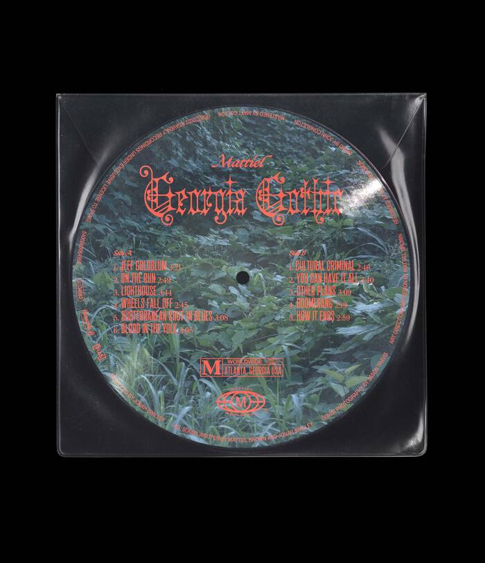 Picture disc design with screenprinted PVC sleeve, back.
