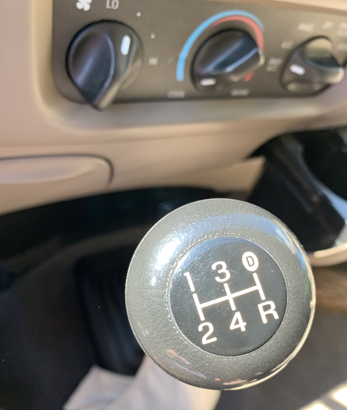 Even the shifter knob of the Ford pickup (1997–2004) gets in on the use of the groovy, 1970s Modula font. 2003 model shown.