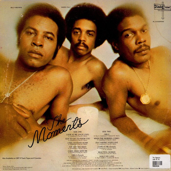 The track list on the back cover is set in , and the credits in .