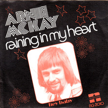 Arnie McKay – “Raining In My Heart” / “Hey Baby” Dutch single cover