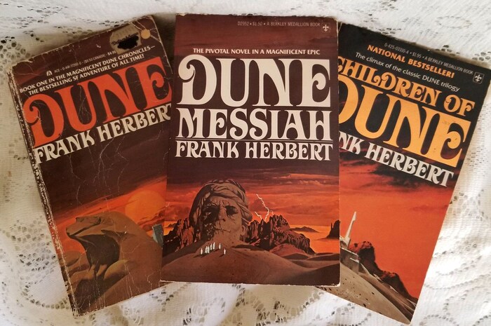 Dune, Dune Messiah, and Children of Dune, in undated paperback editions by Ace and Berkley Medallion