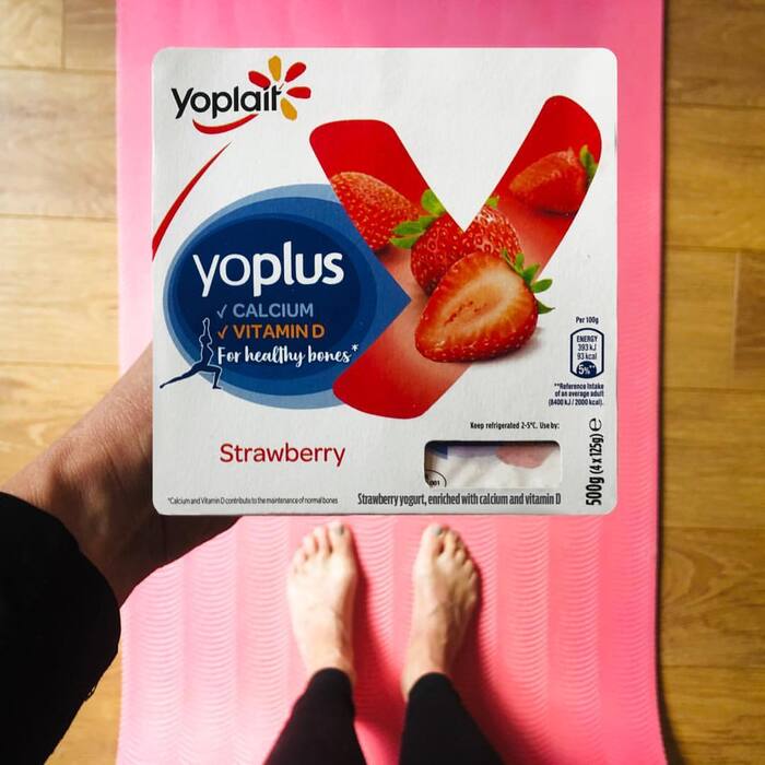 Omnes and Organika on a pack of four yogurt pots. The Yoplait and Yoplus logos are custom.