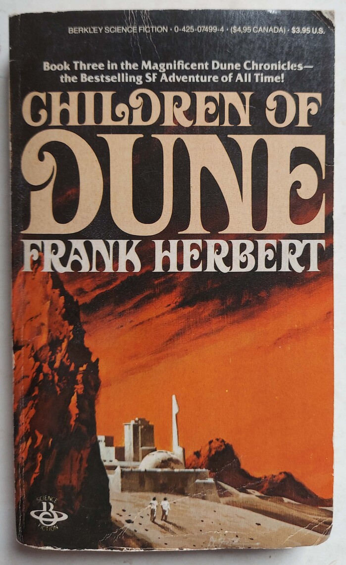 A later printing of Children of Dune by Berkley, 1984. Instead of golden embossed letters, it features plain beige ones.