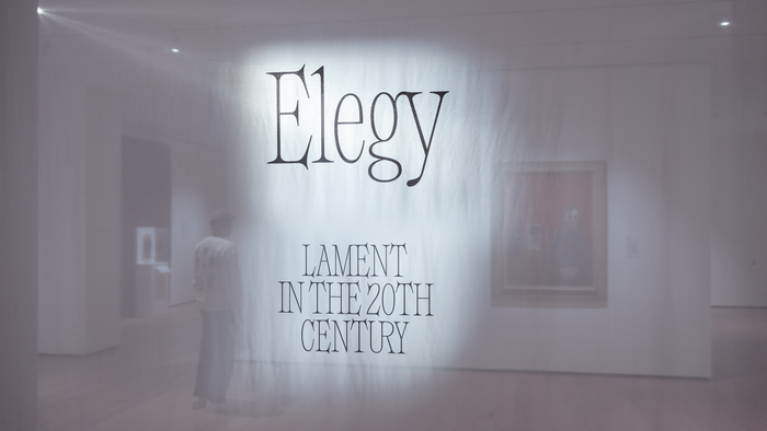 “The title treatment was printed on soft fabric draped freely from the ceiling, intended to represent a mourning veil, or the barrier between the living and those who have passed.” – Hanna Karraby
