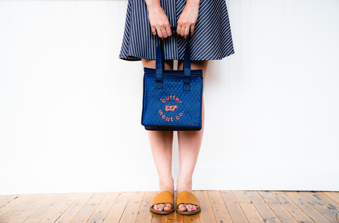 Blue petite beef cooler bag with Butter Meat Co. logo