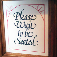 Pizza Hut seating sign