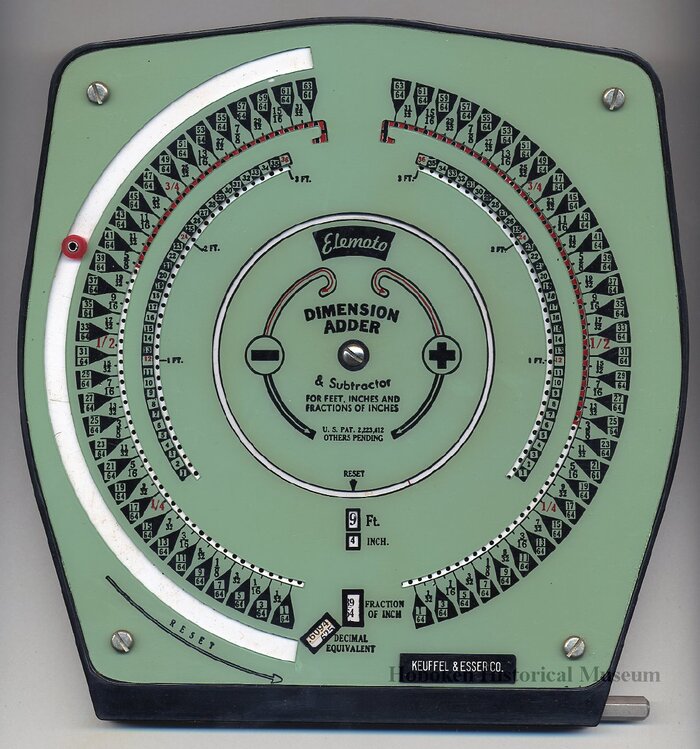 Here, Elemoto appears in a different script, set on a curve and shown in reverse. Its name is . Maybe this was just before Commercial Script came to be in use for the Elemoto logo, or maybe it was the result of constraints of printing on the plastic face of the adding machine. Other features on the plastic face appear to be hand painted or stamped.