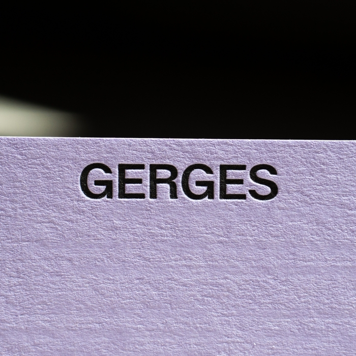 Detail of the embossed business cards