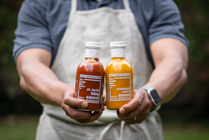 St. Louis BBQ Sauce and Coconut Curry Sauce labels